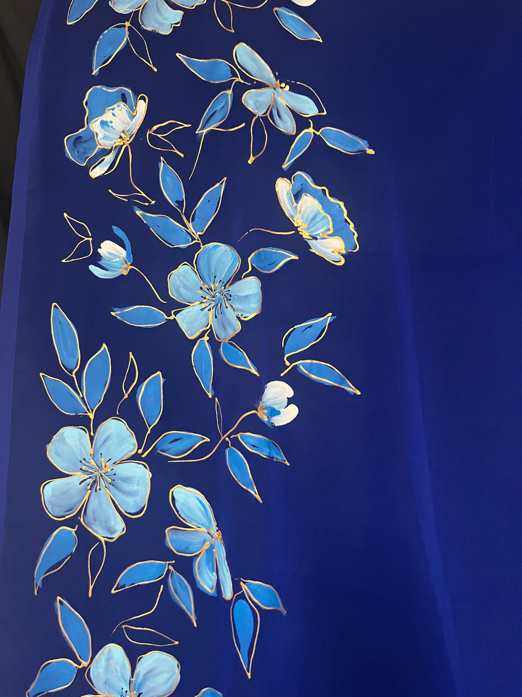Blue flowers on a blue georgette saree : Neelanjali