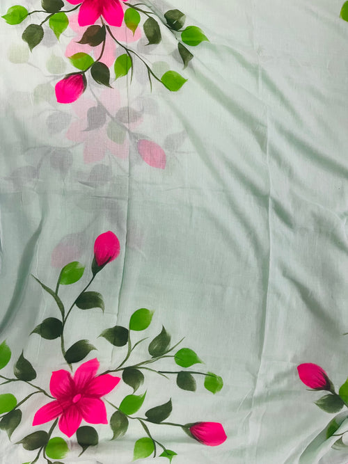 Pista green hand painted florals on mul cotton saree