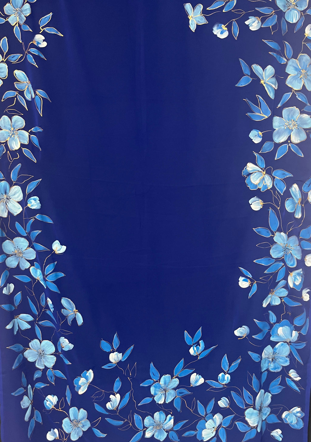 Blue flowers on a blue georgette saree : Neelanjali