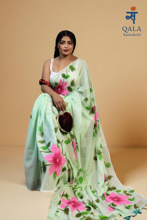 Pista green hand painted florals on mul cotton saree
