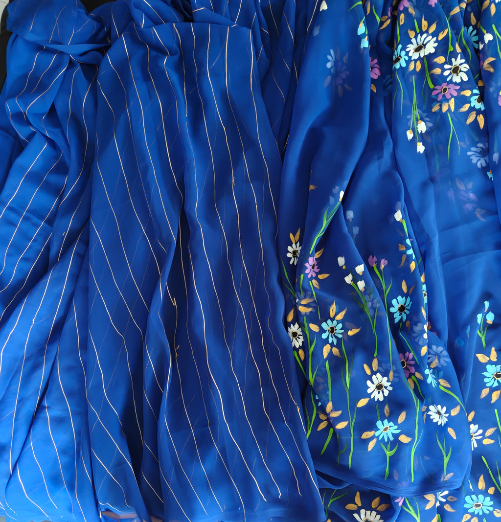 Blue floral georgette saree : Indraneeli Vasant