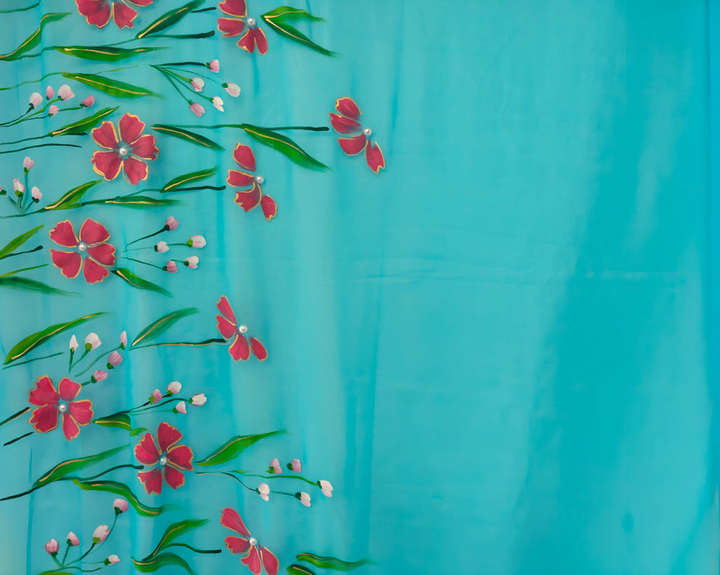 Light blue with coral red florals georgette saree : Gulnaar Baadal