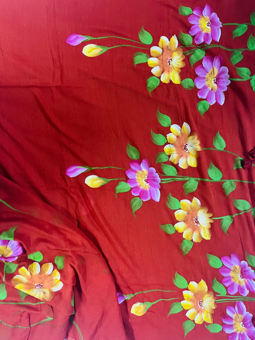 Vermicelli orange hand painted florals on mul cotton saree
