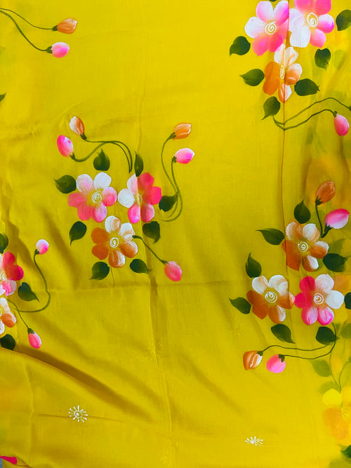 Yellow hand painted florals on mul cotton saree