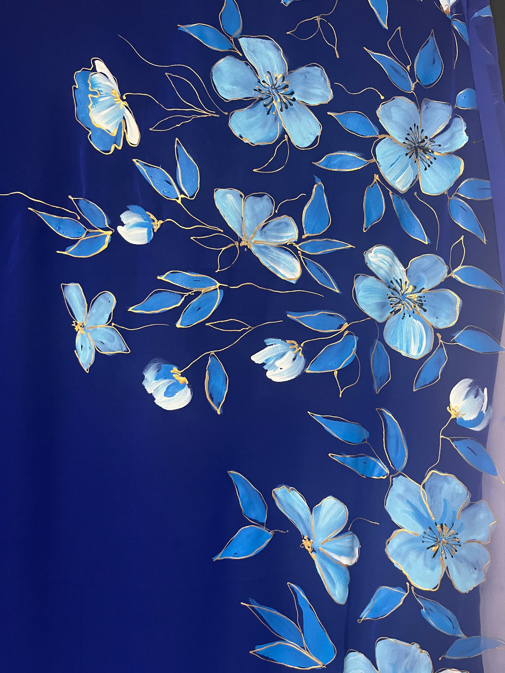 Blue flowers on a blue georgette saree : Neelanjali