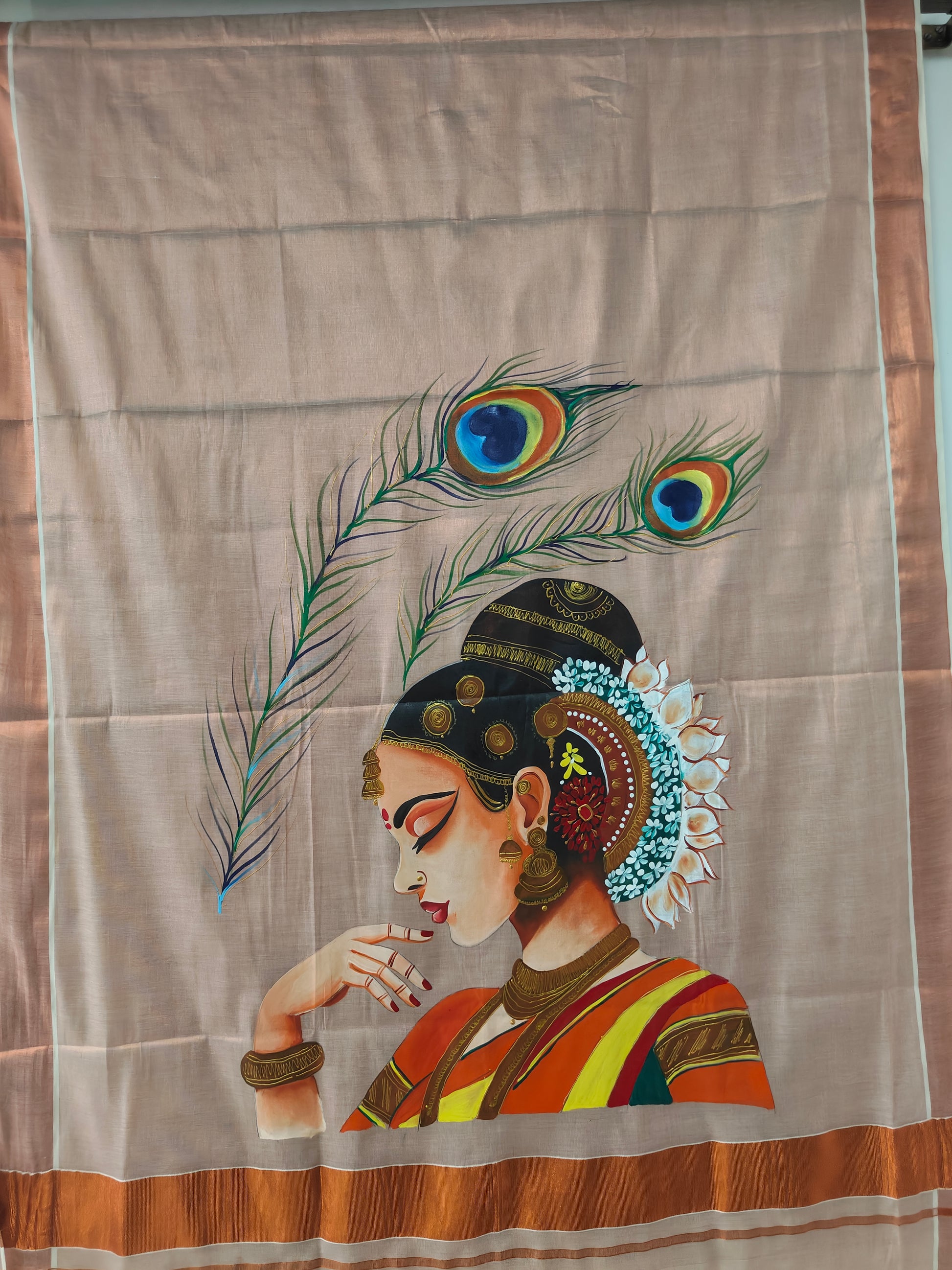 Orange Kerala tissue saree : Radha’s silent Melody