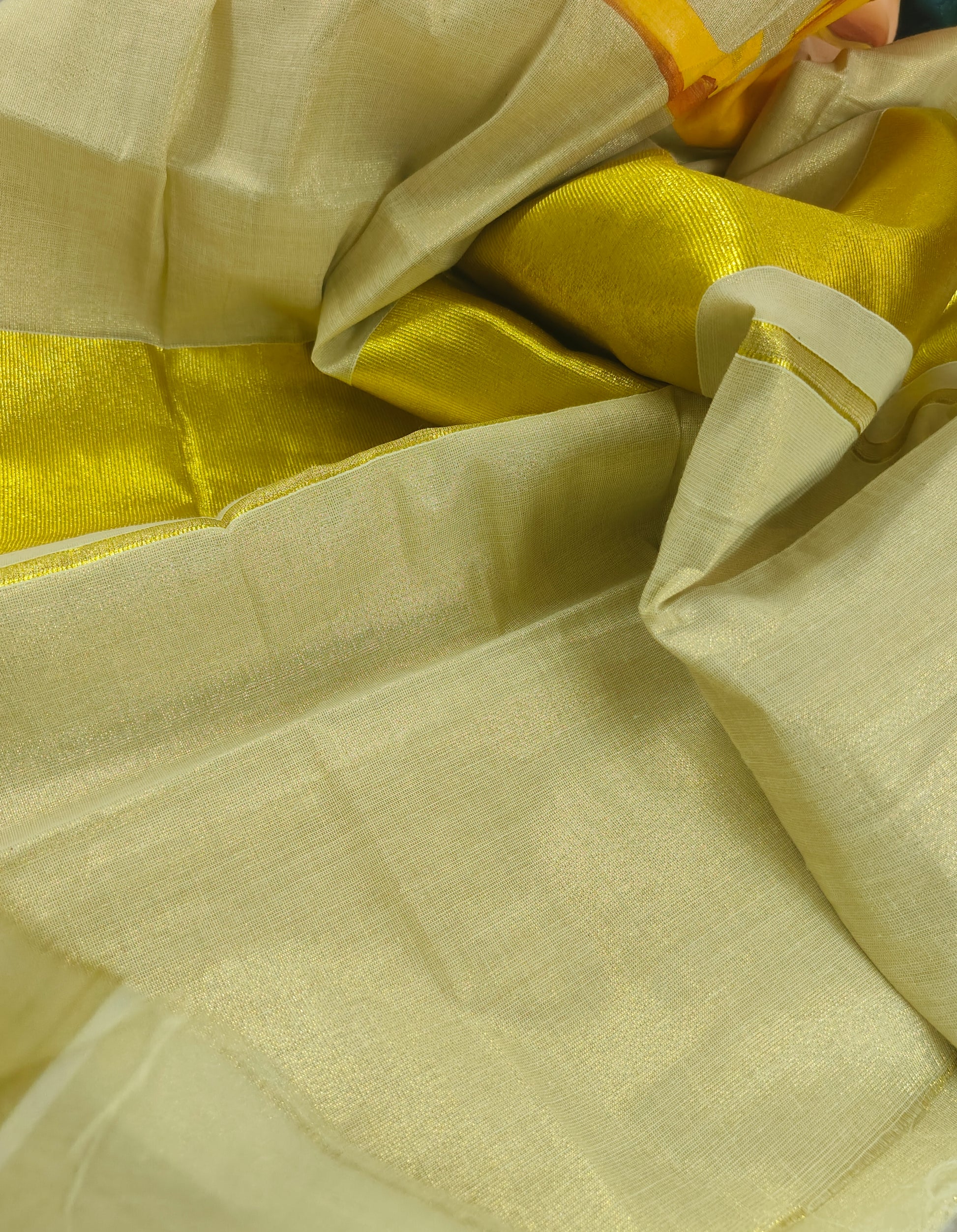 Golden tissue Kerala saree “ The Divine Bond : The Krishna Venu saree”