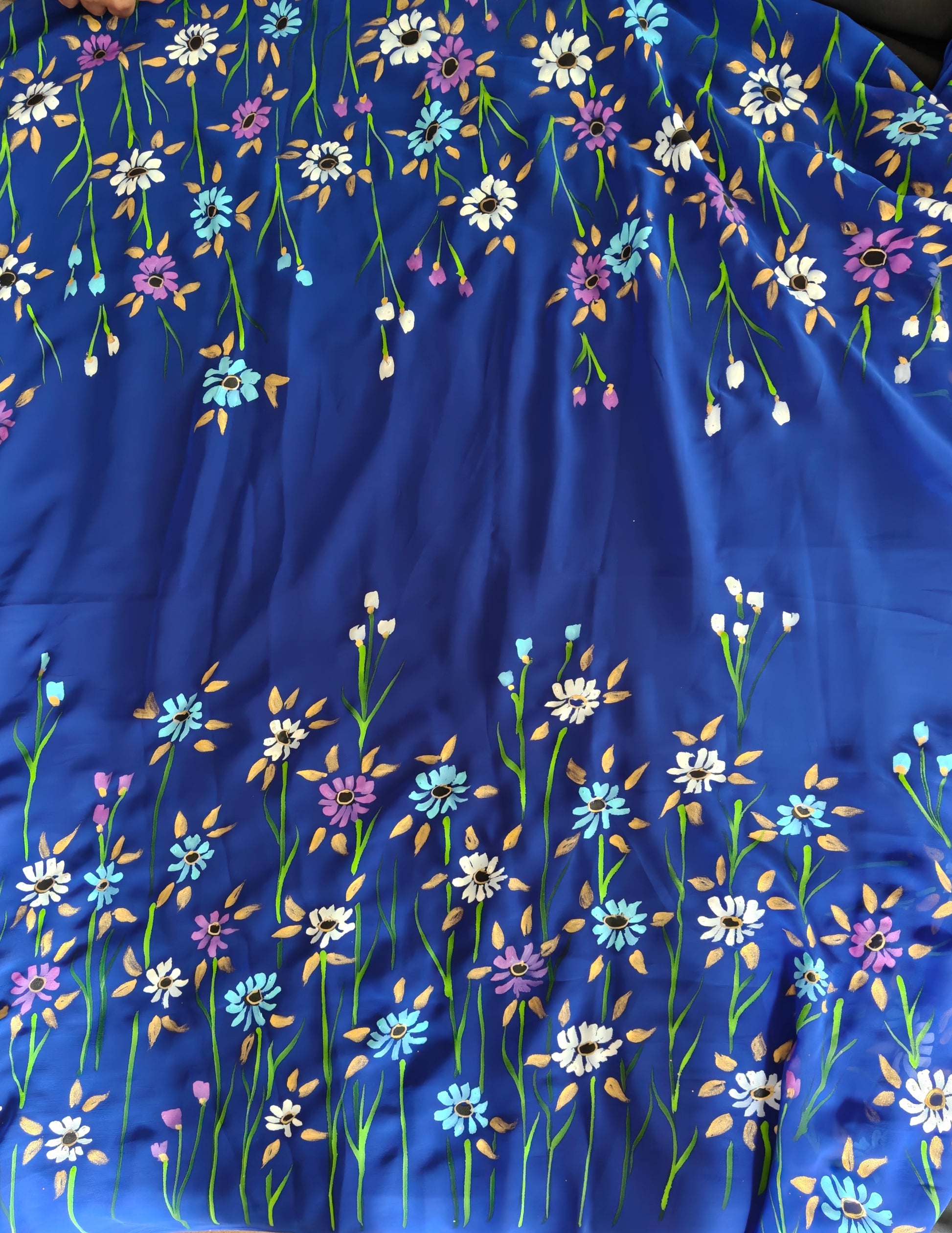 Blue floral georgette saree : Indraneeli Vasant