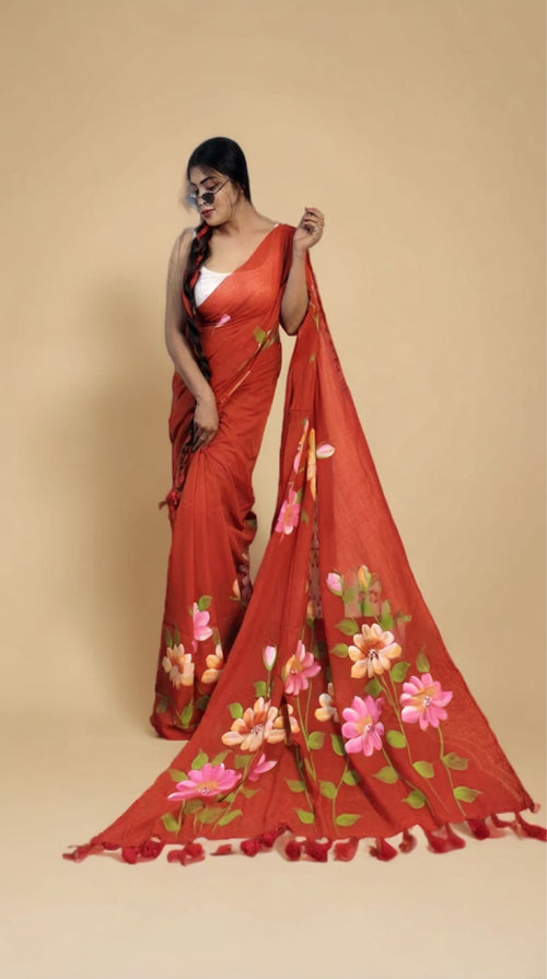 Vermicelli orange hand painted florals on mul cotton saree